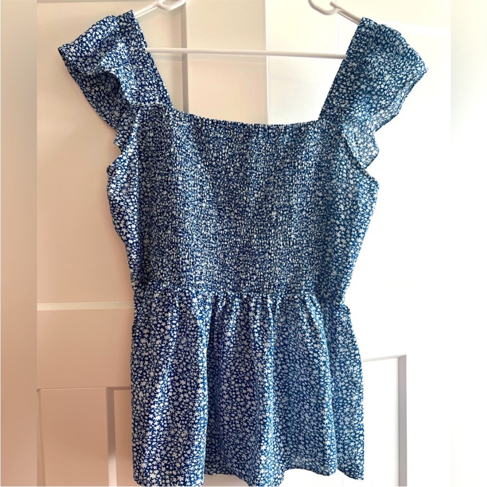 Ruffle sleeve, peplum style, floral print blouse